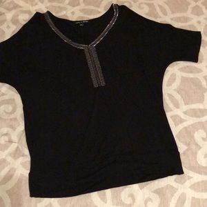 “Cold-shoulder” blouse